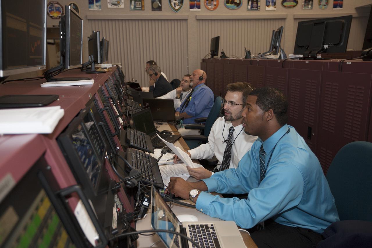 CAPE CANAVERAL, Fla. – In the Hangar AE Launch Vehicle Data Center at Cape Canaveral Air Force Station in Florida, NASA and contractor managers and engineers monitor progress of the countdown for the launch the agency's Tracking and Data Relay Satellite, or TDRS-L, spacecraft atop a United Launch Alliance Atlas V rocket. The TDRS-L spacecraft is the second of three new satellites designed to ensure vital operational continuity for NASA by expanding the lifespan of the Tracking and Data Relay Satellite System TDRSS fleet, which consists of eight satellites in geosynchronous orbit. The spacecraft provide tracking, telemetry, command and high bandwidth data return services for numerous science and human exploration missions orbiting Earth. These include NASA's Hubble Space Telescope and the International Space Station. TDRS-L has a high-performance solar panel designed for more spacecraft power to meet the growing S-band communications requirements. TDRSS is one of NASA Space Communication and Navigation’s SCaN three networks providing space communications to NASA’s missions. For more information more about TDRS-L, visit: http:__www.nasa.gov_tdrs To learn more about SCaN, visit: www.nasa.gov_scan Photo credit: NASA_Kim Shiflett