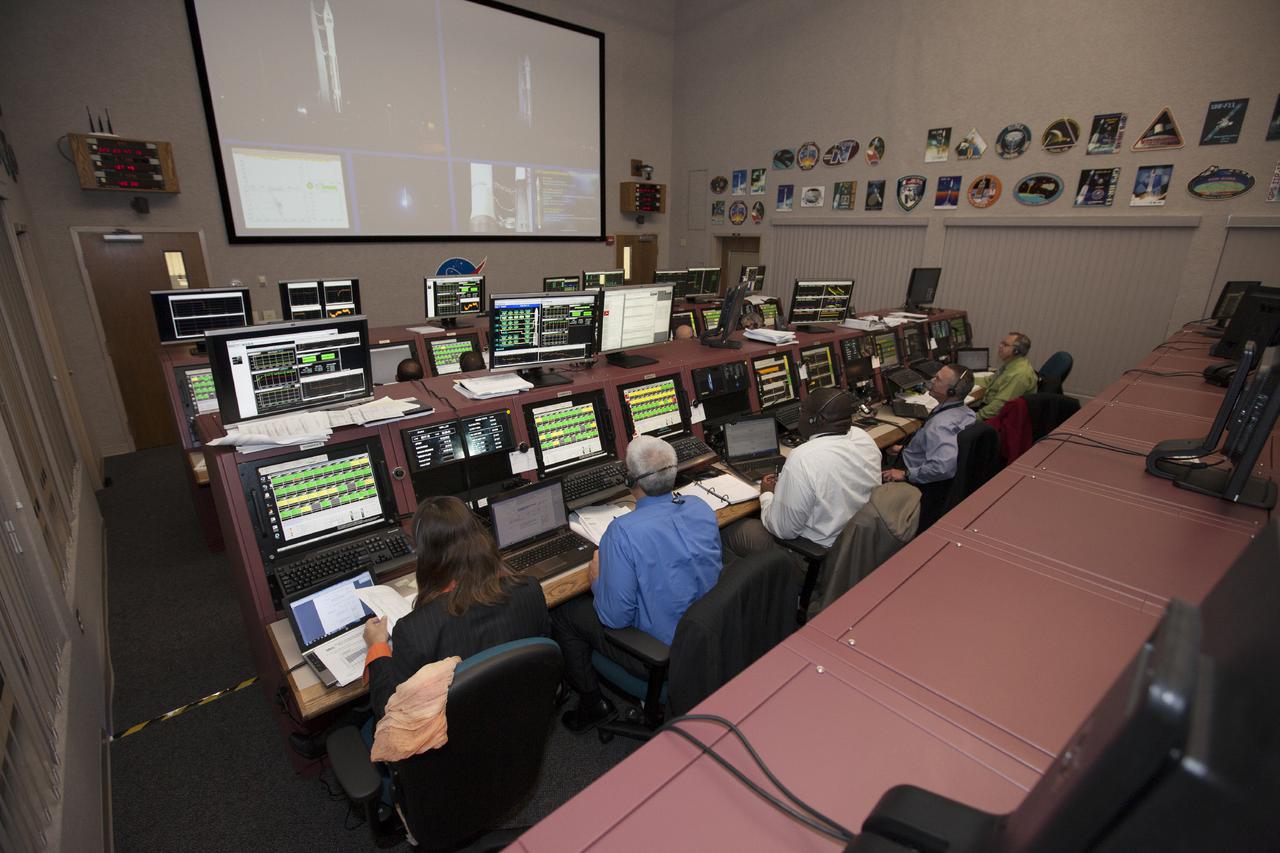 CAPE CANAVERAL, Fla. – In the Hangar AE Launch Vehicle Data Center at Cape Canaveral Air Force Station in Florida, NASA and contractor managers and engineers monitor progress of the countdown for the launch the agency's Tracking and Data Relay Satellite, or TDRS-L, spacecraft atop a United Launch Alliance Atlas V rocket. The TDRS-L spacecraft is the second of three new satellites designed to ensure vital operational continuity for NASA by expanding the lifespan of the Tracking and Data Relay Satellite System TDRSS fleet, which consists of eight satellites in geosynchronous orbit. The spacecraft provide tracking, telemetry, command and high bandwidth data return services for numerous science and human exploration missions orbiting Earth. These include NASA's Hubble Space Telescope and the International Space Station. TDRS-L has a high-performance solar panel designed for more spacecraft power to meet the growing S-band communications requirements. TDRSS is one of NASA Space Communication and Navigation’s SCaN three networks providing space communications to NASA’s missions. For more information more about TDRS-L, visit: http:__www.nasa.gov_tdrs To learn more about SCaN, visit: www.nasa.gov_scan Photo credit: NASA_Kim Shiflett