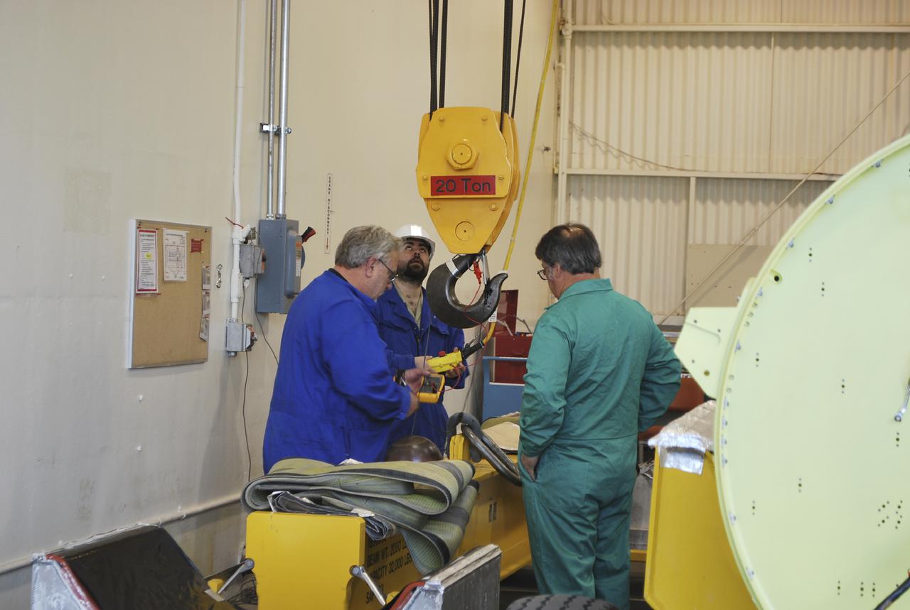 VANDENBERG AIR FORCE BASE, Calif. – Workers at Vandenberg Air Force Base in California prepare to conduct a leak check on the solid rocket motors, or SRMs, for NASA's Orbiting Carbon Observatory-2, the OCO-2 mission. The SRMs will be attached to a United Launch Alliance Delta II rocket slated to launch the OCO-2 spacecraft from Space Launch Complex 2 in July. OCO-2 will collect precise global measurements of carbon dioxide in the Earth's atmosphere and provide scientists with a better idea of the chemical compound's impacts on climate change. Scientists will analyze this data to improve our understanding of the natural processes and human activities that regulate the abundance and distribution of this important atmospheric gas. Photo credit: NASA_Randy Beaudoin