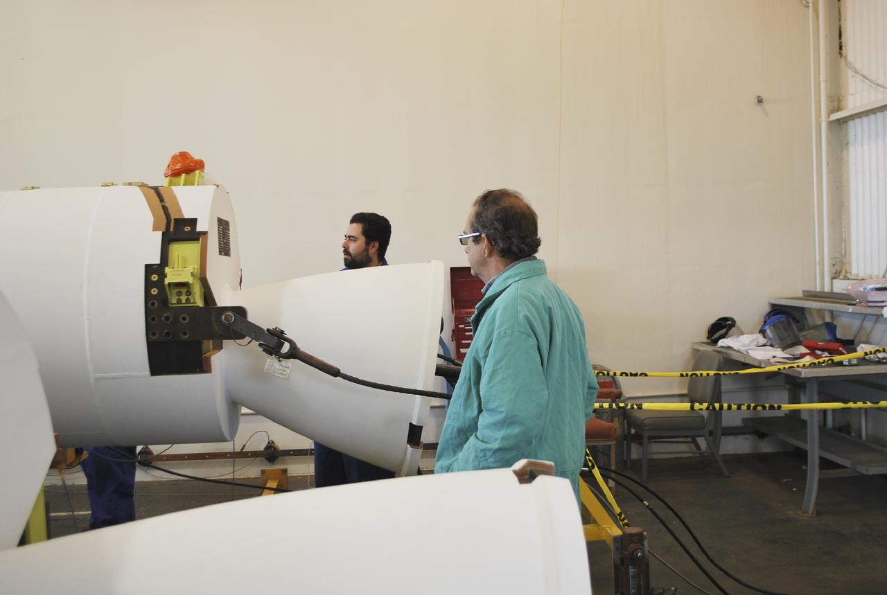VANDENBERG AIR FORCE BASE, Calif. – Workers at Vandenberg Air Force Base in California conduct a leak check on the solid rocket motors, or SRMs, for NASA's Orbiting Carbon Observatory-2, the OCO-2 mission. The SRMs will be attached to a United Launch Alliance Delta II rocket slated to launch the OCO-2 spacecraft from Space Launch Complex 2 in July. OCO-2 will collect precise global measurements of carbon dioxide in the Earth's atmosphere and provide scientists with a better idea of the chemical compound's impacts on climate change. Scientists will analyze this data to improve our understanding of the natural processes and human activities that regulate the abundance and distribution of this important atmospheric gas. Photo credit: NASA_Randy Beaudoin