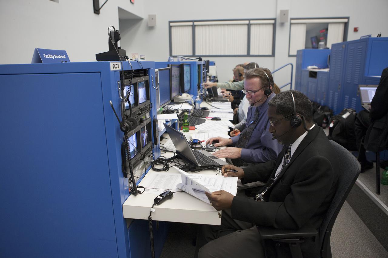 CAPE CANAVERAL, Fla. – At Cape Canaveral Air Force Station's Atlas V Spaceflight Operations Center NASA and contractor managers and engineers monitor progress of the countdown for the launch the agency's Tracking and Data Relay Satellite, or TDRS-L, spacecraft atop a United Launch Alliance Atlas V rocket. The TDRS-L spacecraft is the second of three new satellites designed to ensure vital operational continuity for NASA by expanding the lifespan of the Tracking and Data Relay Satellite System TDRSS fleet, which consists of eight satellites in geosynchronous orbit. The spacecraft provide tracking, telemetry, command and high bandwidth data return services for numerous science and human exploration missions orbiting Earth. These include NASA's Hubble Space Telescope and the International Space Station. TDRS-L has a high-performance solar panel designed for more spacecraft power to meet the growing S-band communications requirements. TDRSS is one of NASA Space Communication and Navigation’s SCaN three networks providing space communications to NASA’s missions. For more information more about TDRS-L, visit: http:__www.nasa.gov_tdrs To learn more about SCaN, visit: www.nasa.gov_scan Photo credit: NASA_Kim Shiflett