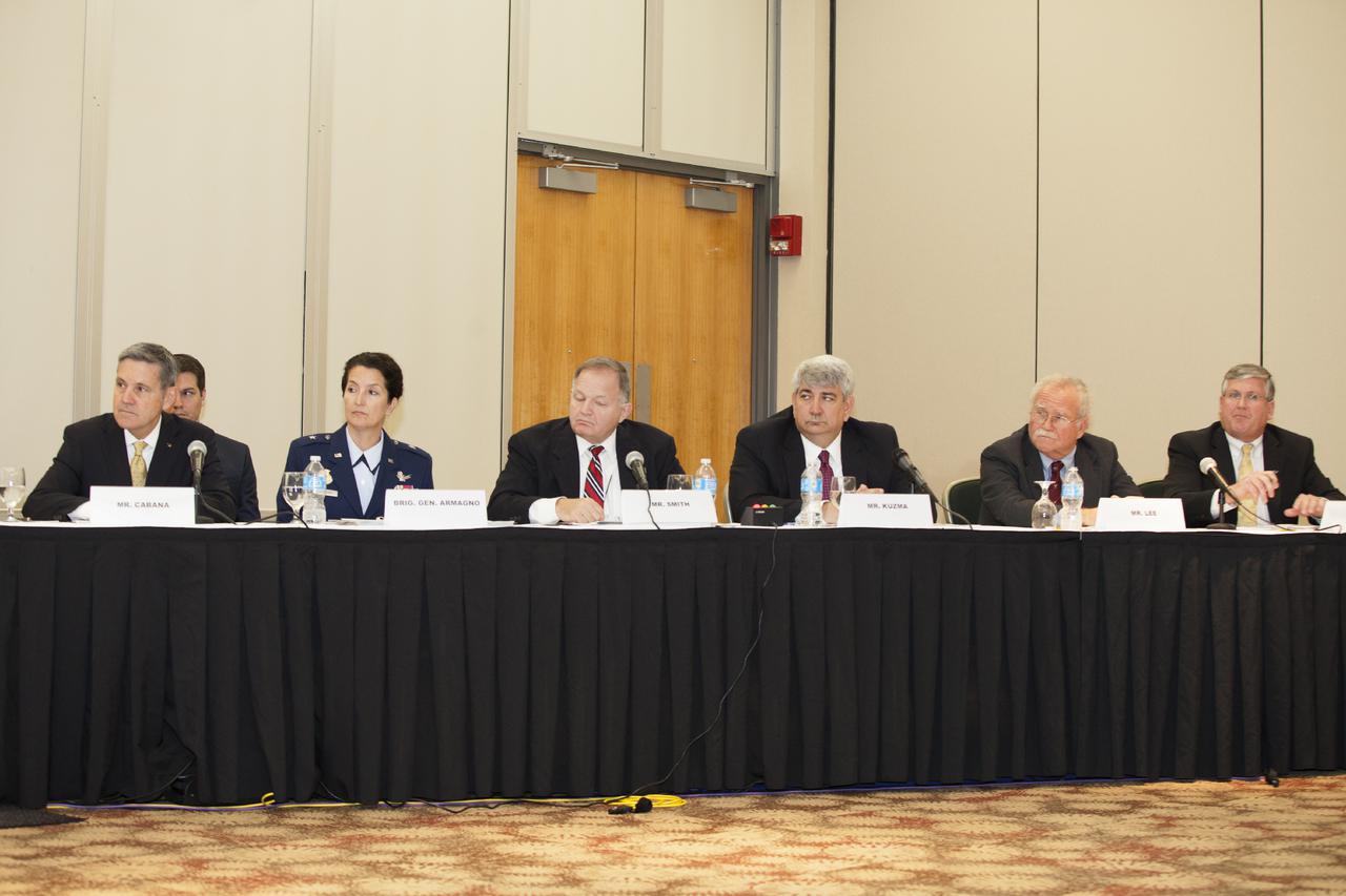 CAPE CANAVERAL, Fla. – At the Kurt H. Debus Conference Facility at the Kennedy Space Center Visitor Complex, witnesses listen during a hearing of the U.S. House of Representatives' Subcommittee on Government Operations. From the left are Bob Cabana, director of the Kennedy Space Center, Brig. Gen. Nina Armagno, commander of the 45th Space Wing and director of the Eastern Range at Patrick Air Force Base, John Smith, regional commissioner of the U.S. General Services Administration, Jim Kuzma, chief operating officer of Space Florida, Charles Lee of the Audubon Society, and John Walsh, chief executive officer of the Canaveral Port Authority.    The Congressional hearing took place to review plans for putting vacant buildings and excess property at the Kennedy Space Center to their best and most productive use. Photo credit: NASA_Daniel Casper