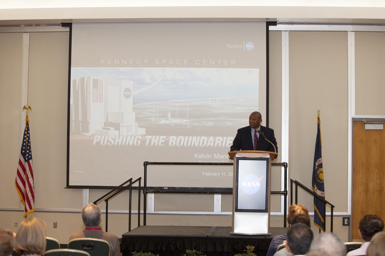 CAPE CANAVERAL, Fla. – NASA Kennedy Space Center Associate Director Kelvin Manning welcomes Kennedy's volunteers to a KSC Volunteer Appreciation Event held in the Debus Conference Facility at the Kennedy Space Center Visitor Complex in Florida.  Manning briefed the group on future prospects for the space center with a presentation entitled 'Pushing the Boundaries.' To learn about NASA's Speakers Bureau, visit http:__speakers.grc.nasa.gov_speaker. Photo credit: NASA_Daniel Casper