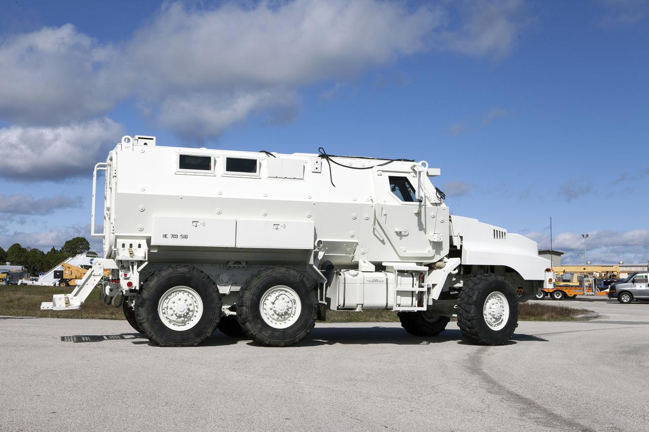 CAPE CANAVERAL, Fla. – One of four new emergency egress vehicles, called Mine-Resistant Ambush-Protection, or MRAP, vehicles is driven to the Maintenance and Operations Facility at NASA’s Kennedy Space Center in Florida. The MRAPs arrived from the U.S. Army Red River Depot in Texarkana, Texas in December 2013. The vehicles were processed in and then transported to the Rotation, Processing and Surge Facility near the Vehicle Assembly Building for temporary storage. The Ground Systems Development and Operations Program at Kennedy led the efforts to an emergency egress vehicle that future astronauts could quickly use to leave the Launch Complex 39 area in case of an emergency. During crewed launches of NASA’s Space Launch System and Orion spacecraft, the MRAP will be stationed by the slidewire termination area at the pad. In case of an emergency, the crew will ride a slidewire to the ground and immediately board the MRAP for safe egress from the pad. The new vehicles replace the M-113 vehicles that were used during the Space Shuttle Program. Photo credit: NASA_Kim Shiflett