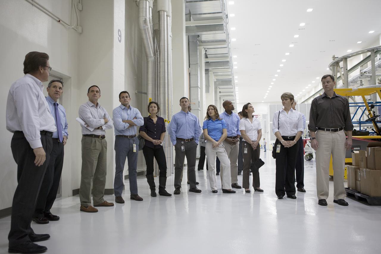CAPE CANAVERAL, Fla. -- In the Operations and Checkout Building of NASA's Kennedy Space Center in Florida, agency astronauts are briefed on preparations for the launch the Orion spacecraft on Exploration Flight Test EFT-1. Plans call for the Lockheed Martin-built Orion to launch atop a United Launch Alliance Delta IV Heavy rocket from Cape Canaveral Air Force Station. Participating in the briefing, from the left, are Jules Schneider senior manager of Project Engineering for Lockheed Martin, center director Bob Cabana, Stu Mcclung, of NASA at the Johnson Space Center, Josh Cassada, Jessica Meir, Andrew Morgan, Christina Hammock, Victor Glover, Nicole Mann, Anne McClain and Tyler Nick Hague. The astronaut class of 2013 was selected by NASA after an extensive year-and-a-half search. The new group will help the agency push the boundaries of exploration and travel to new destinations in the solar system. To learn more about the astronaut class of 2013, visit: http:__www.nasa.gov_astronauts_2013astroclass.html Photo credit: NASA_Kim Shiflett