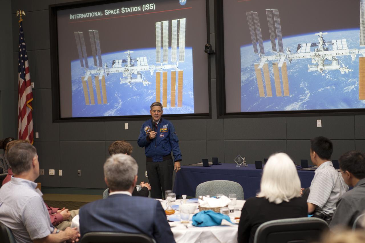 CAPE CANAVERAL, Fla. – At the Kennedy Space Center Visitor Complex in Florida, Bob Cabana, the center's director, addresses students, teachers, parents and VIPs during the 2014 DuPont Challenge Science Essay Competition awards ceremony at the Operations and Support Building II. The challenge, now in its 28th year, reaches out to students from grades seven through 12 from all 50 states and Canada. More than 200,000 students entered the competition. The DuPont Challenge aims to inspire students to excel and achieve in scientific writing and pursue careers in science, technology, engineering and mathematics STEM. The challenge honors space shuttle Challenger's STS-51L crew members who gave their lives while furthering the cause of exploration and discovery. For more information on the challenge, go to http:__thechallenge.dupont.com_sponsors_nasa.php. Photo credit: NASA_Kim Shiflett