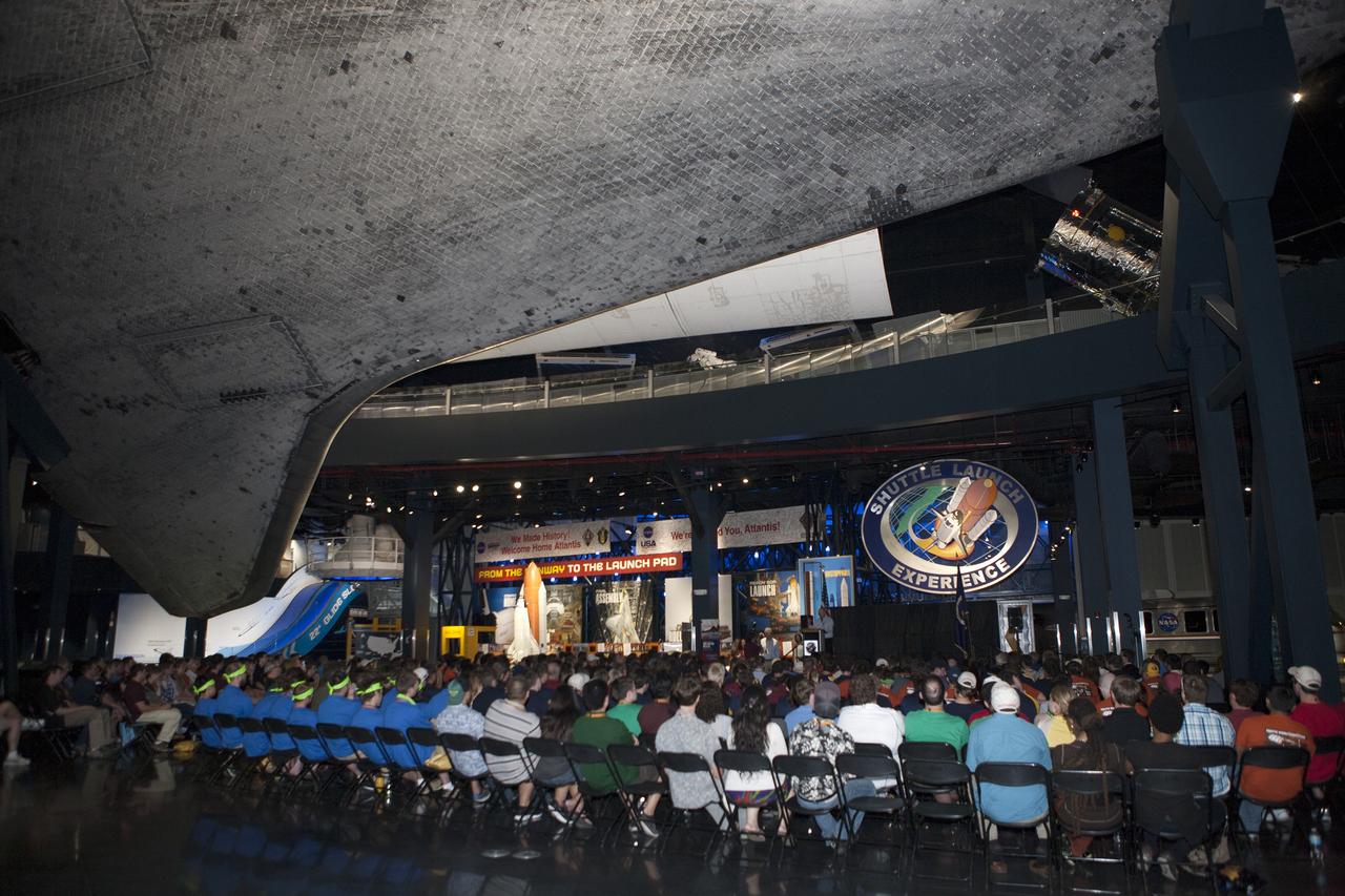 CAPE CANAVERAL, Fla. -- NASA's 2014 Robotic Mining Competition award ceremony was held inside the Space Shuttle Atlantis attraction at the Kennedy Space Center Visitor Complex in Florida. More than 35 teams from colleges and universities around the U.S. designed and built remote-controlled robots for the mining competition, held May 19-23 at the visitor complex. The competition is a NASA Human Exploration and Operations Mission Directorate project designed to engage and retain students in science, technology, engineering and mathematics, or STEM, fields by expanding opportunities for student research and design. Teams use their remote-controlled robotics to maneuver and dig in a supersized sandbox filled with a crushed material that has characteristics similar to Martian soil. The objective of the challenge is to see which team’s robot can collect and move the most regolith within a specified amount of time. The competition includes on-site mining, writing a systems engineering paper, performing outreach projects for K-12 students, slide presentation and demonstrations, and team spirit. For more information, visit www.nasa.gov/nasarmc. Photo credit: NASA/Kim Shiflett
