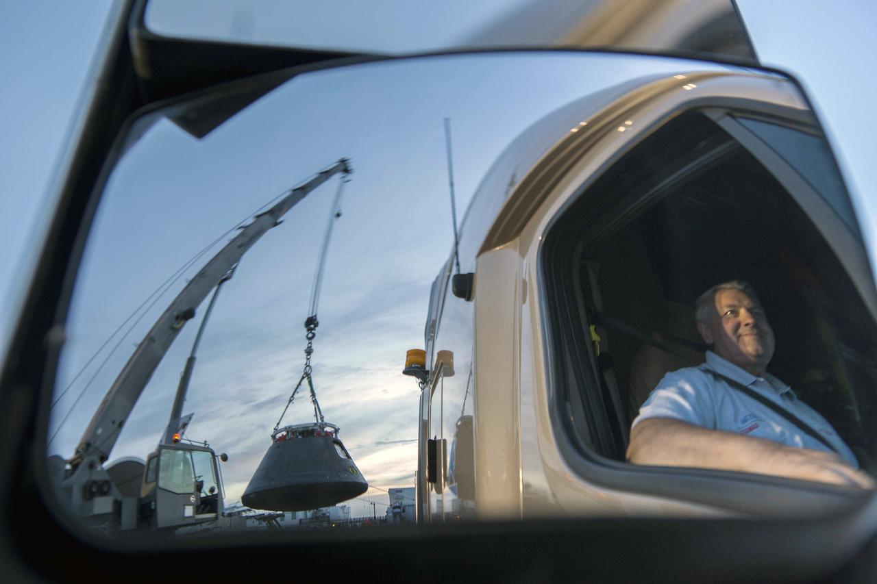 Orion is Taken From Ship and Put in Shipping Container