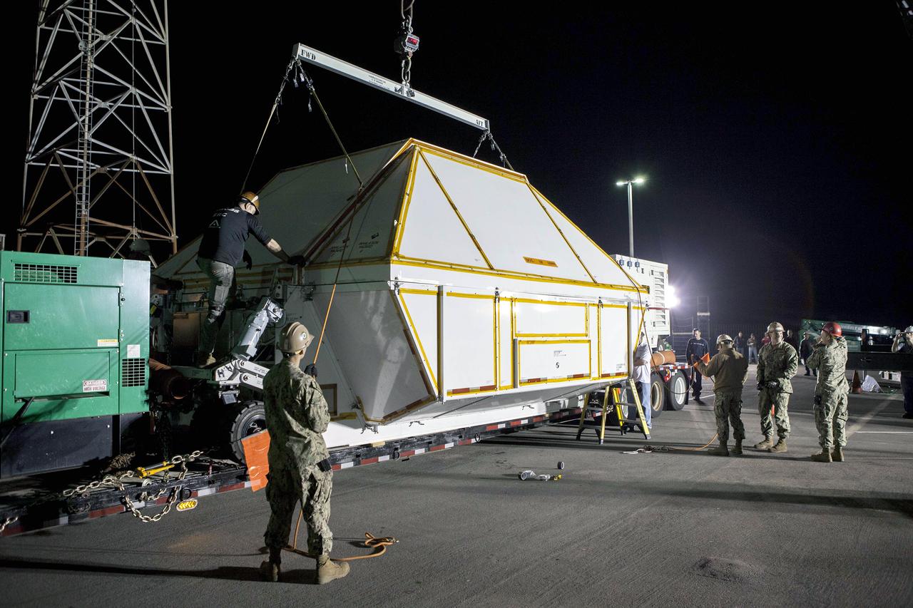 Orion is Taken From Ship and Put in Shipping Container