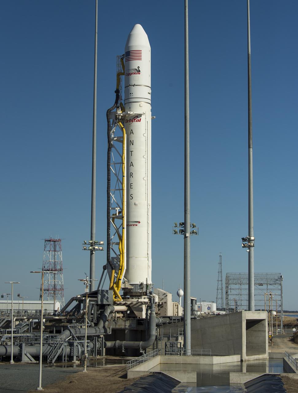 An Orbital Sciences Corporation Antares rocket is seen on launch Pad-0A during sunrise at NASA's Wallops Flight Facility, Wednesday, January 8, 2014, Wallops Island, VA. Photo Credit: (NASA/Bill Ingalls)