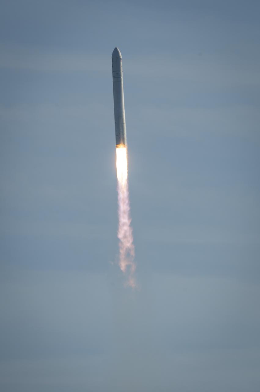 An Orbital Sciences Corporation Antares rocket is seen as it launches from Pad-0A at NASA's Wallops Flight Facility, Thursday, January 9, 2014, Wallops Island, VA. Antares is carrying the Cygnus spacecraft on a cargo resupply mission to the International Space Station. The Orbital-1 mission is Orbital Sciences' first contracted cargo delivery flight to the space station for NASA. Cygnus is carrying science experiments, crew provisions, spare parts and other hardware to the space station. Photo Credit: (NASA/Bill Ingalls)
