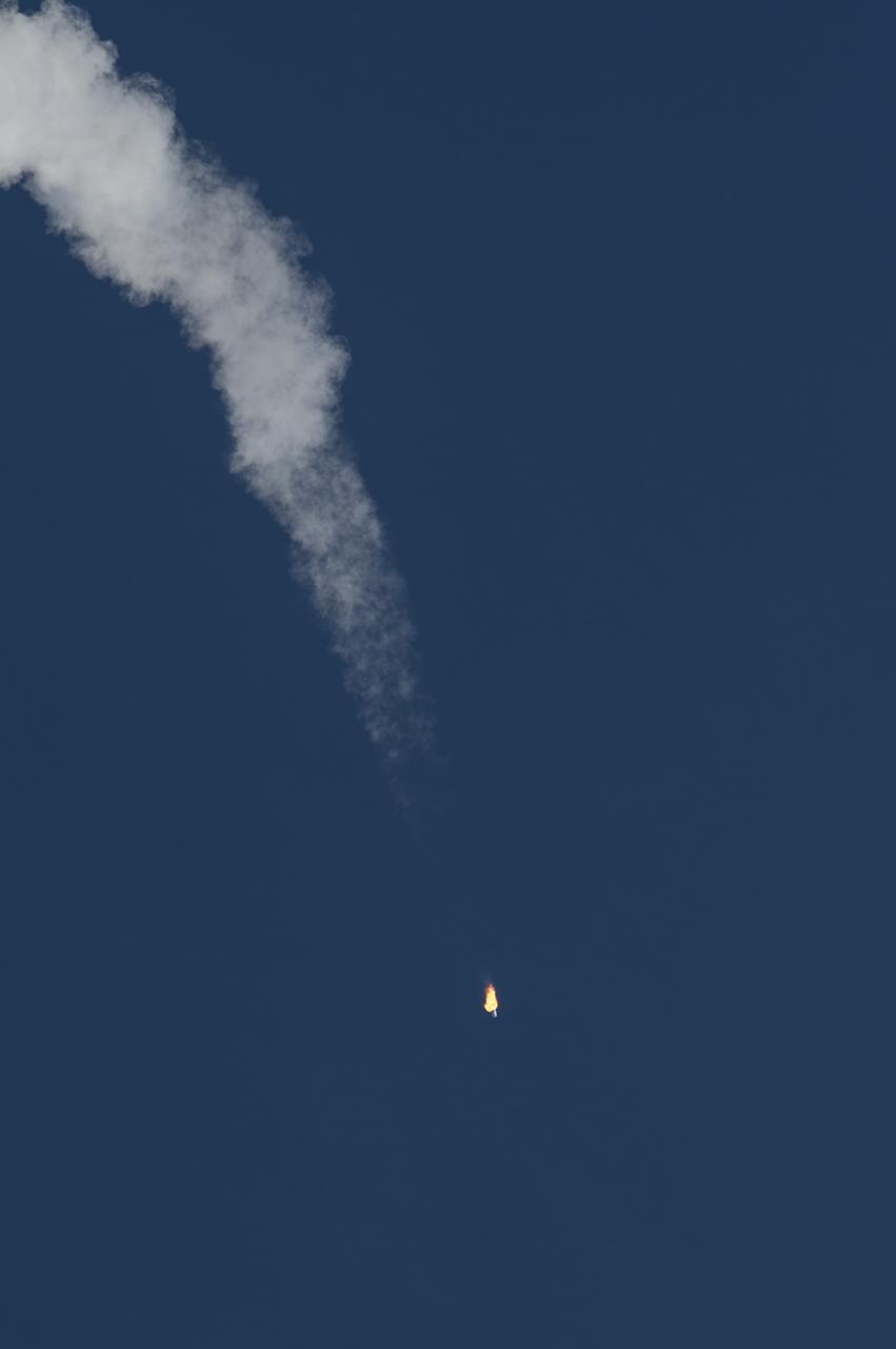 An Orbital Sciences Corporation Antares rocket is seen as it launches from Pad-0A at NASA's Wallops Flight Facility, Thursday, January 9, 2014, Wallops Island, VA. Antares is carrying the Cygnus spacecraft on a cargo resupply mission to the International Space Station. The Orbital-1 mission is Orbital Sciences' first contracted cargo delivery flight to the space station for NASA. Cygnus is carrying science experiments, crew provisions, spare parts and other hardware to the space station. Photo Credit: (NASA/Bill Ingalls)