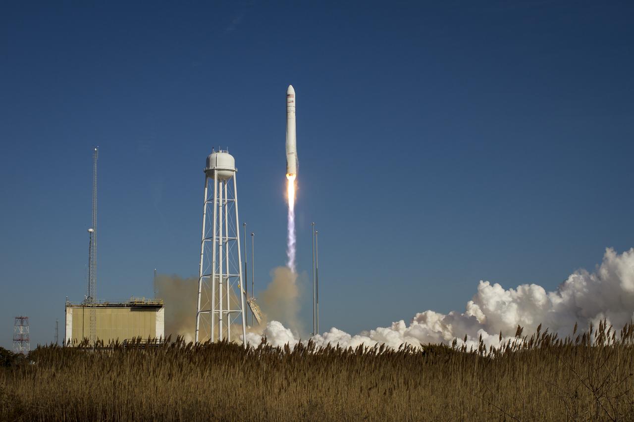 An Orbital Sciences Corporation Antares rocket is seen as it launches from Pad-0A at NASA's Wallops Flight Facility, Thursday, January 9, 2014, Wallops Island, VA. Antares is carrying the Cygnus spacecraft on a cargo resupply mission to the International Space Station. The Orbital-1 mission is Orbital Sciences' first contracted cargo delivery flight to the space station for NASA. Cygnus is carrying science experiments, crew provisions, spare parts and other hardware to the space station. Photo Credit: (NASA/Bill Ingalls)