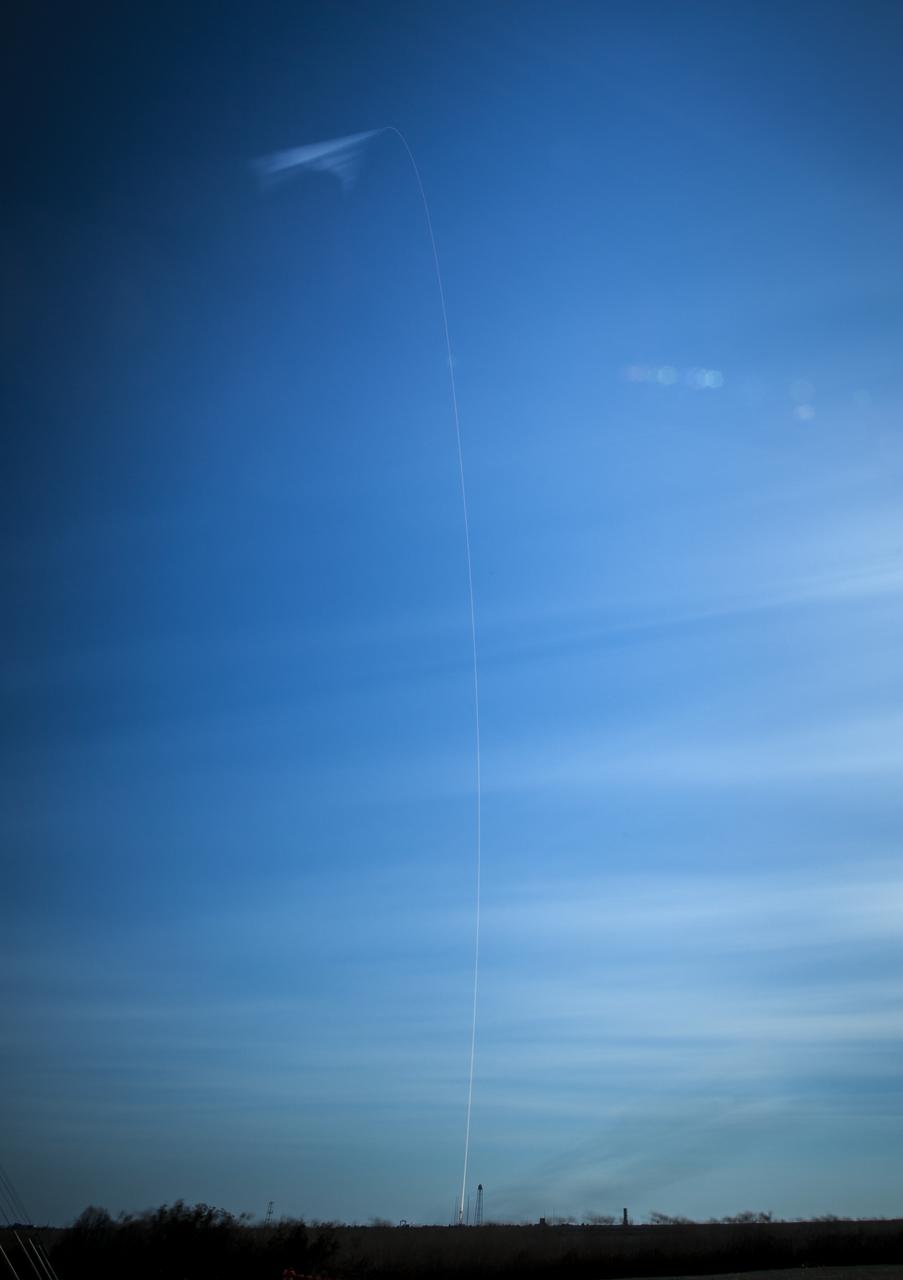 The trail of an Orbital Sciences Corporation Antares rocket is seen in this two minute exposure as it launches from Pad-0A at NASA's Wallops Flight Facility, Thursday, January 9, 2014, Wallops Island, VA. Antares is carrying the Cygnus spacecraft on a cargo resupply mission to the International Space Station. The Orbital-1 mission is Orbital Sciences' first contracted cargo delivery flight to the space station for NASA. Cygnus is carrying science experiments, crew provisions, spare parts and other hardware to the space station. Photo Credit: (NASA/Bill Ingalls)