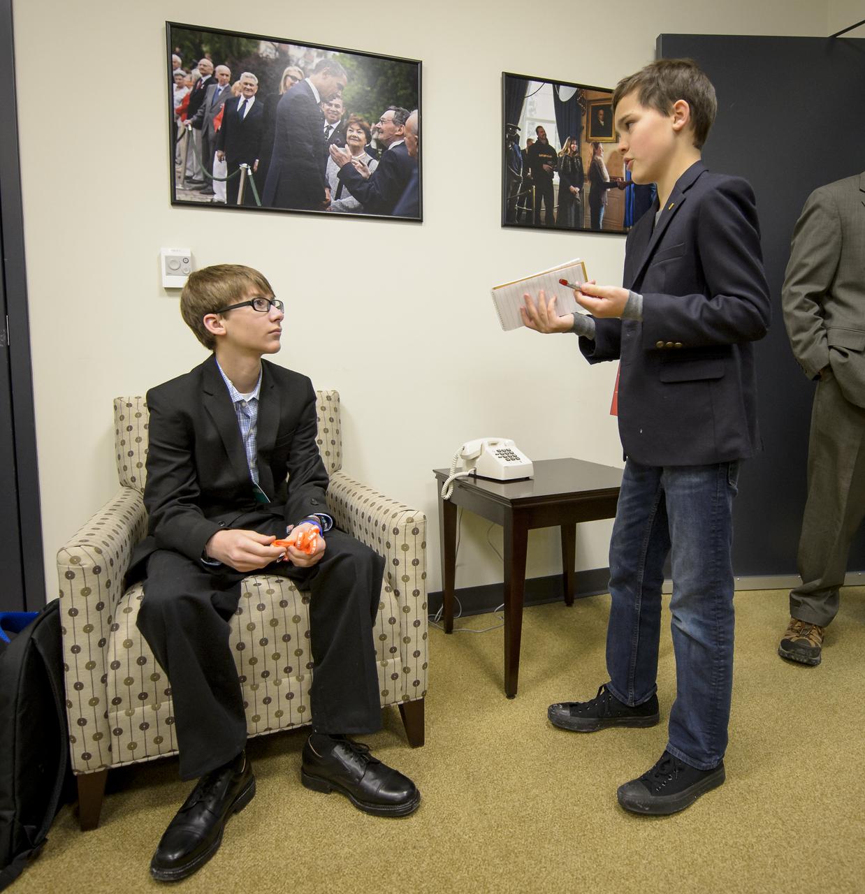 National Geographic Kids reporter Trevor Jehl, right, interviews Joey Hudy, Anthem, AZ, 16-year-old self-described “Maker” at the annual White House State of Science, Technology, Engineering, and Math (SoSTEM) address, Wednesday, Jan. 29, 2014, in the South Court Auditorium in the Eisenhower Executive Office Building on the White House complex in Washington. Joey sat with the First Lady at the President’s 2014 State of the Union Address after his first shot to fame in 2012 when he attended the White House Science Fair where the President took a turn using his “extreme marshmallow cannon” to launch a marshmallow across the East Room of the White House.  Photo Credit: (NASA/Bill Ingalls)