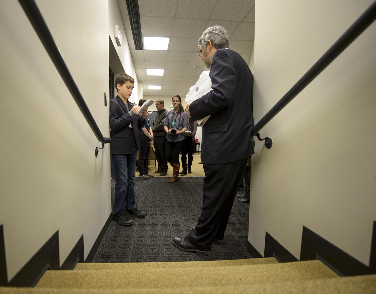 Dr. John P. Holdren, Assistant to the President for Science and Technology and Director of the White House Office of Science & Technology Policy, right, is interviewed by National Geographic Kids reporter Trevor Jehl ahead of the annual White House State of Science, Technology, Engineering, and Math (SoSTEM) address, Wednesday, Jan. 29, 2014, in the South Court Auditorium in the Eisenhower Executive Office Building on the White House complex in Washington. Photo Credit: (NASA/Bill Ingalls)