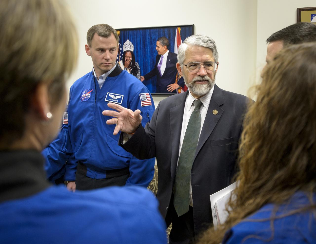Dr. John P. Holdren, Assistant to the President for Science and Technology and Director of the White House Office of Science & Technology Policy, talks with NASA's 2013 astronaut candidates at the annual White House State of Science, Technology, Engineering, and Math (SoSTEM) address, Wednesday, Jan. 29, 2014, in the South Court Auditorium in the Eisenhower Executive Office Building on the White House complex in Washington. Photo Credit: (NASA/Bill Ingalls)