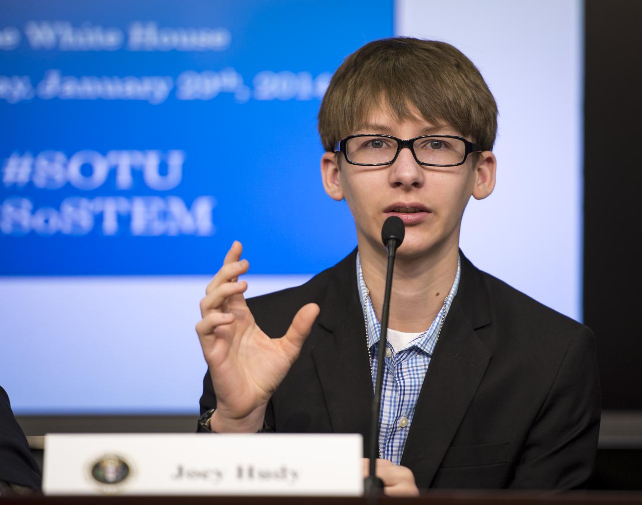 Joey Hudy, Anthem, AZ, 16-year-old self-described “Maker” answers a question from the audience at the annual White House State of Science, Technology, Engineering, and Math (SoSTEM) address, Wednesday, Jan. 29, 2014,  in the South Court Auditorium in the Eisenhower Executive Office Building on the White House complex in Washington. Joey sat with the First Lady at the President’s 2014 State of the Union Address after his first shot to fame in 2012 when he attended the White House Science Fair where the President took a turn using his “extreme marshmallow cannon” to launch a marshmallow across the East Room of the White House.  Photo Credit: (NASA/Bill Ingalls)