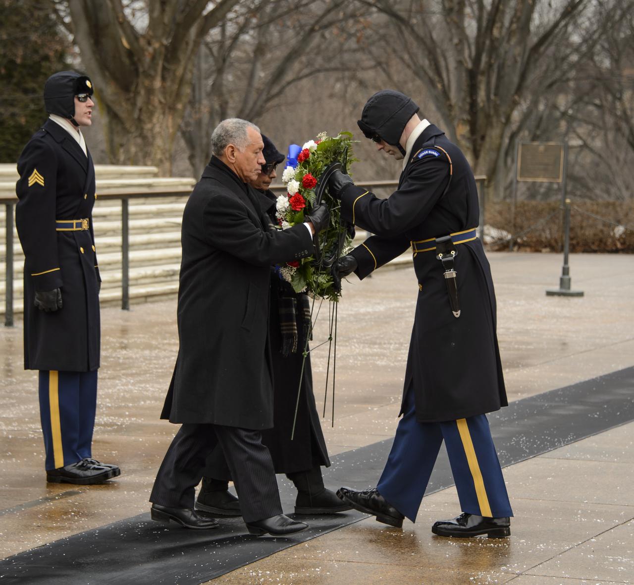 NASA Administrator Charles Bolden and his wife Alexis lay a wreath at the Tomb of the Unknowns as part of NASA's Day of Remembrance, Friday, Jan. 31, 2014, at Arlington National Cemetery.  The wreaths were laid in memory of those men and women who lost their lives in the quest for space exploration.  Photo Credit: (NASA/Bill Ingalls)