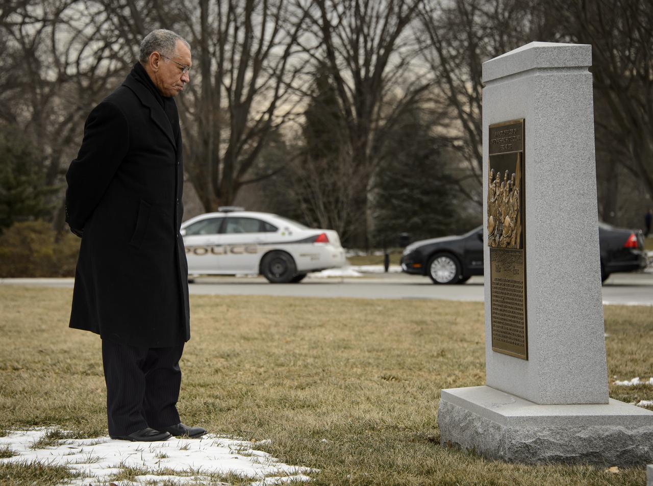 NASA Administrator Charles Bolden visits the Space Shuttle Columbia Memorial during a wreath laying ceremony that was part of NASA's Day of Remembrance, Friday, Jan. 31, 2014 at Arlington National Cemetery.  Wreaths were laid in memory of those men and women who lost their lives in the quest for space exploration.  Photo Credit: (NASA/Bill Ingalls)