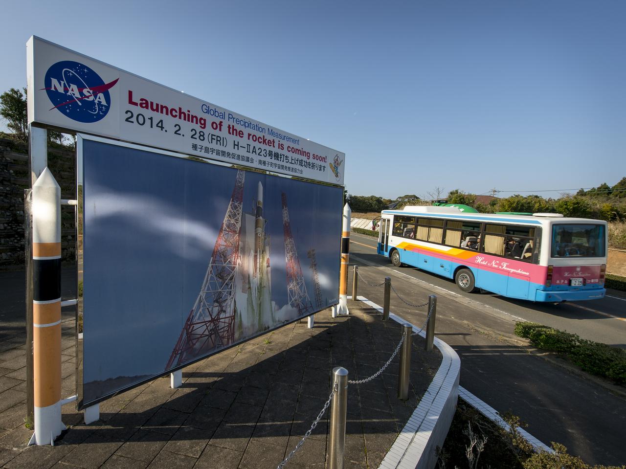 A roadside sign announces the upcoming launch of an H-IIA rocket carrying the Global Precipitation Measurement (GPM) Core Observatory, Saturday, Feb. 22, 2014, Minamitane Town, Tanegashima Island, Japan. Once launched from the Japan Aerospace Exploration Agency’s (JAXA) Tanegashima Space Center (TNSC) the NASA-JAXA GPM spacecraft will collect information that unifies data from an international network of existing and future satellites to map global rainfall and snowfall every three hours. The launch is planned for Feb. 28, 2014.  Photo Credit: (NASA/Bill Ingalls)