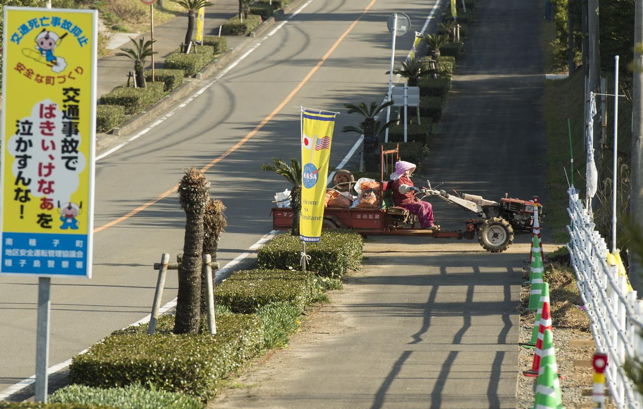 Roadside flags welcome the NASA team and visitors to Minamitame Town, one of only a few small towns located outside of the Japan Aerospace Exploration Agency’s (JAXA) Tanegashima Space Center (TNSC), where the launch of an H-IIA rocket carrying the Global Precipitation Measurement (GPM) Core Observatory will take place in the next week, Saturday, Feb. 22, 2014, Tanegashima Island, Japan. The NASA-Japan Aerospace Exploration Agency (JAXA) GPM spacecraft will collect information that unifies data from an international network of existing and future satellites to map global rainfall and snowfall every three hours.  The launch is planned for Feb. 28, 2014. Photo Credit: (NASA/Bill Ingalls)