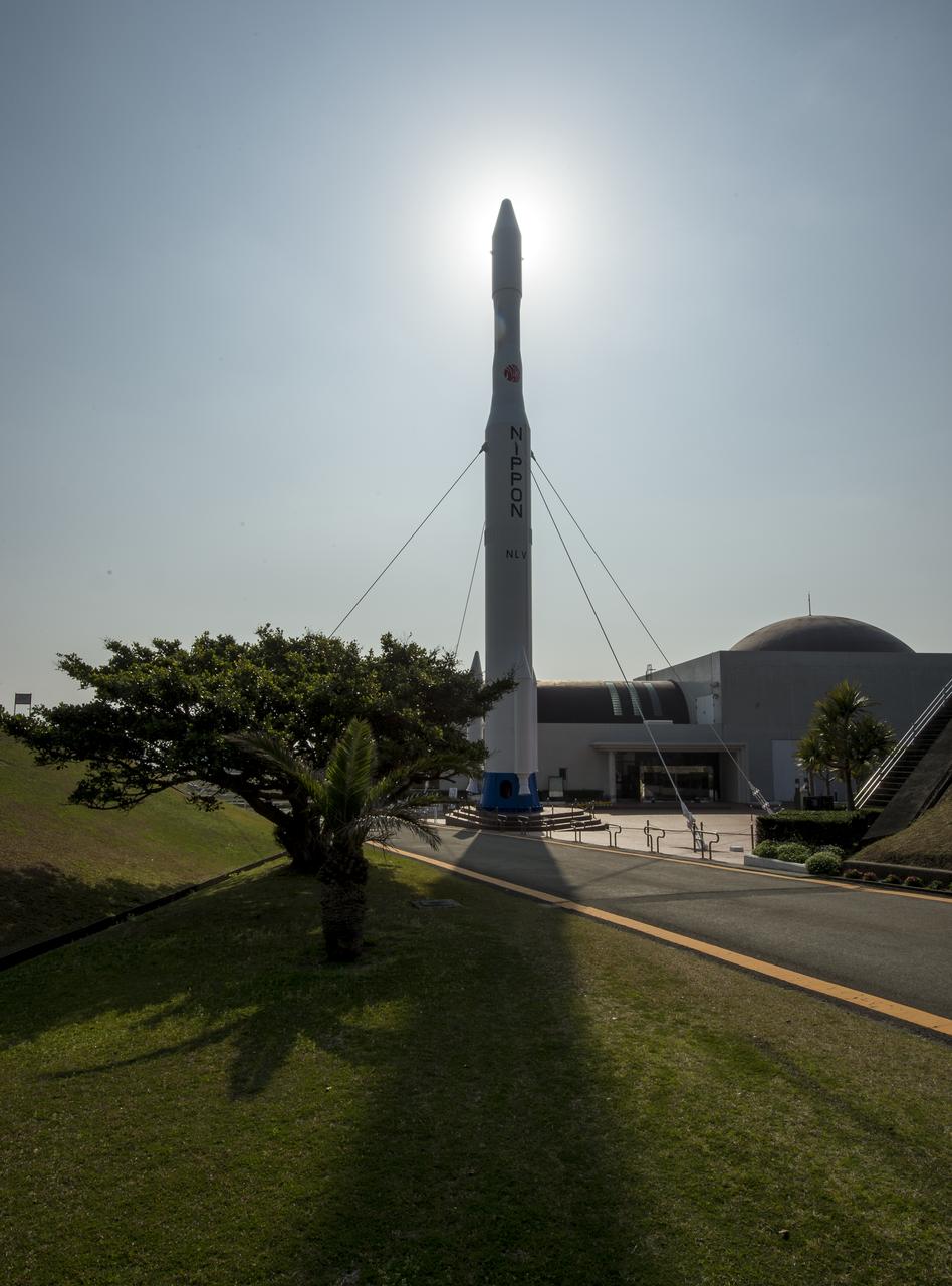 A rocket is seen at the entrance to the visitor's center of the Tanegashima Space Center (TNSC), Sunday, Feb. 23, 2014, Tanegashima Island, Japan. A Japanese H-IIA rocket carrying the NASA-Japan Aerospace Exploration Agency (JAXA), Global Precipitation Measurement (GPM) Core Observatory is planned for launch from the space center on Feb. 28, 2014. Once launched, the GPM spacecraft will collect information that unifies data from an international network of existing and future satellites to map global rainfall and snowfall every three hours.  Photo Credit: (NASA/Bill Ingalls)
