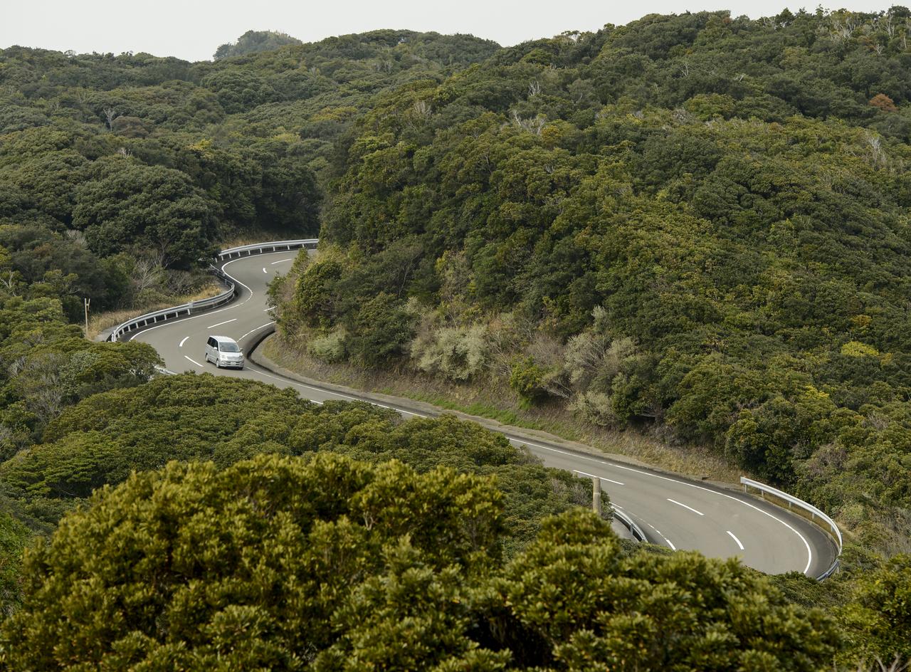 A car drives on the twisty roads that hug the coast line of the Tanegashima Space Center (TNSC) on Sunday, Feb. 23, 2014, Tanegashima Island, Japan. A Japanese H-IIA rocket carrying the NASA-Japan Aerospace Exploration Agency (JAXA), Global Precipitation Measurement (GPM) Core Observatory is planned for launch from the space center on Feb. 28, 2014. Once launched, the GPM spacecraft will collect information that unifies data from an international network of existing and future satellites to map global rainfall and snowfall every three hours.  Photo Credit: (NASA/Bill Ingalls)
