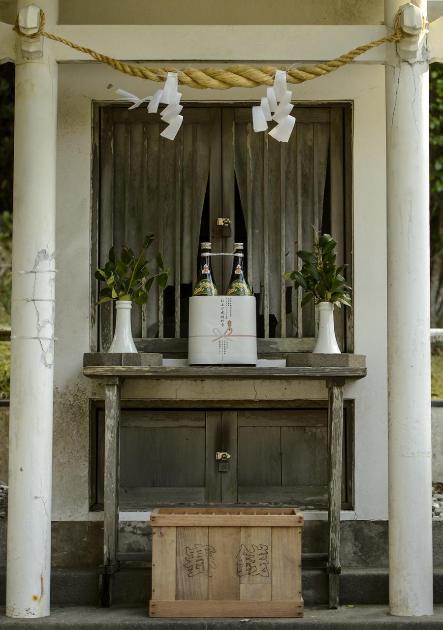 An offering of sake can be seen at the Ebisu Shrine, the first shrine in a traditional San-ja Mairi, or Three Shrine Pilgrimage, in which members of the Japan Aerospace Exploration Agency (JAXA) team pray for a successful launch, Tuesday, Feb. 25, 2014, Tanegashima Island, Japan. A Japanese H-IIA rocket carrying the NASA-JAXA, Global Precipitation Measurement (GPM) Core Observatory is planned for launch from the  Tanegashima Space Center (TNSC)  on Feb. 28, 2014. Once launched, the GPM spacecraft will collect information that unifies data from an international network of existing and future satellites to map global rainfall and snowfall every three hours.  Photo Credit: (NASA/Bill Ingalls)