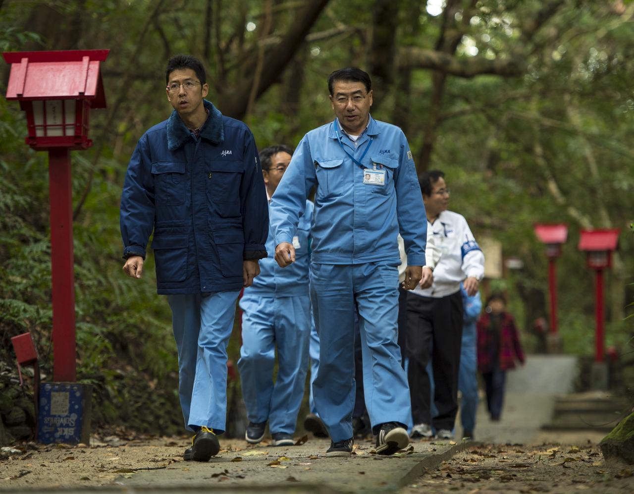 Japan Aerospace Exploration Agency (JAXA) are seen as they depart the Houman Shrine, the third, and final, shrine in a traditional San-ja Mairi, or Three Shrine Pilgrimage, where the team prays for a successful launch, Tuesday, Feb. 25, 2014, Tanegashima Island, Japan. A Japanese H-IIA rocket carrying the NASA-JAXA, Global Precipitation Measurement (GPM) Core Observatory is planned for launch from the Tanegashima Space Center (TNSC) on Feb. 28, 2014. Once launched, the GPM spacecraft will collect information that unifies data from an international network of existing and future satellites to map global rainfall and snowfall every three hours.  Photo Credit: (NASA/Bill Ingalls)