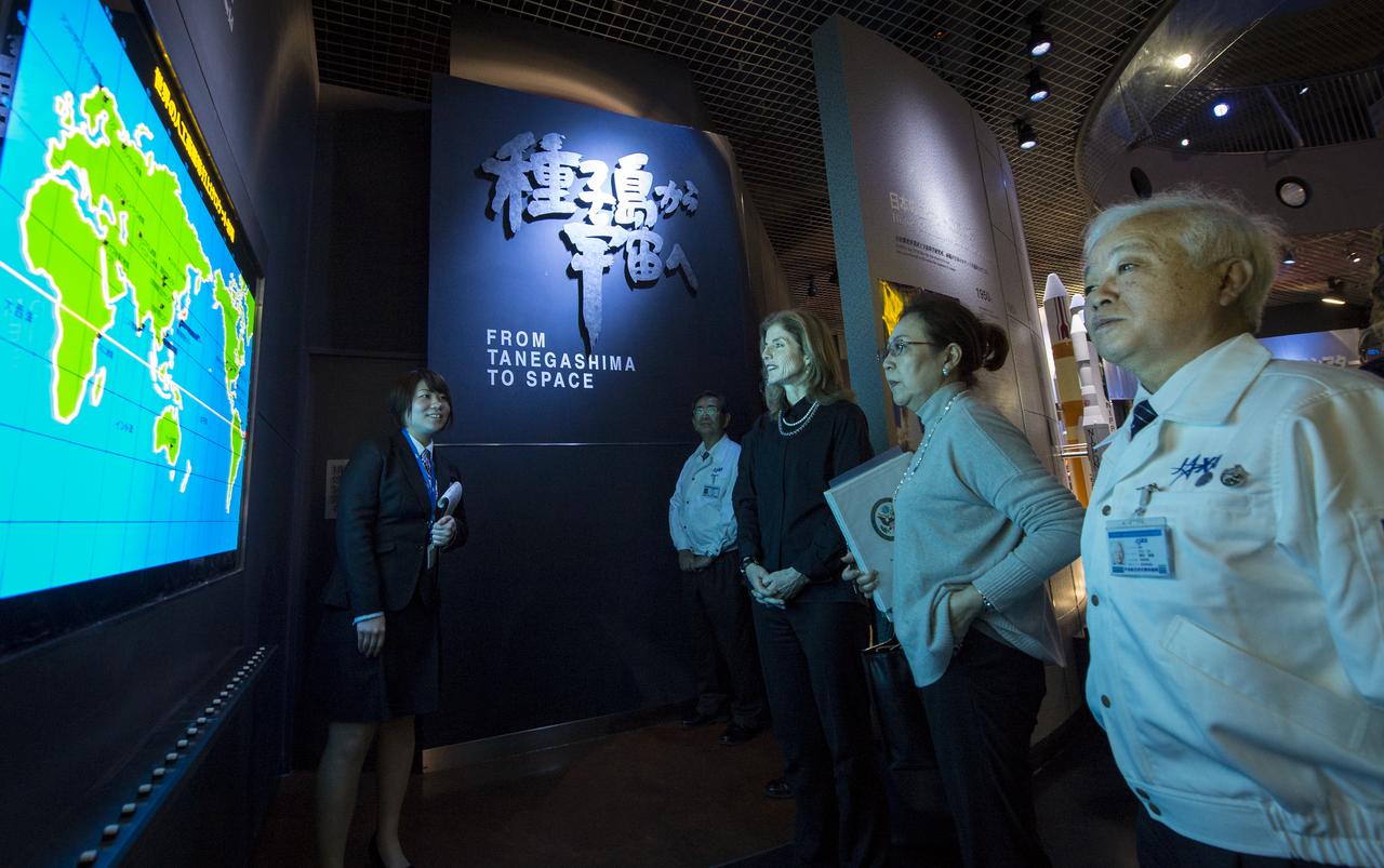 Caroline Bouvier Kennedy, U.S. Ambassador Extraordinary and Plenipotentiary to Japan, center, tours the Tanegashima Space Center, Visitors Center with Japan Aerospace Exploration Agency (JAXA), President, Naoki Okumura, right, on Thursday, Feb. 27, 2014, Tanegashima, Japan.  The Ambassador visiting the space center and hopes to witness the planned launch of a Japanese H-IIA rocket carrying the NASA-JAXA, Global Precipitation Measurement (GPM) Core Observatory. Once launched, the GPM spacecraft will collect information that unifies data from an international network of existing and future satellites to map global rainfall and snowfall every three hours.  Photo Credit: (NASA/Bill Ingalls)