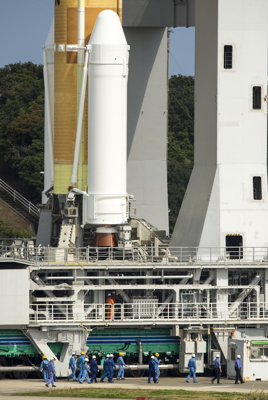 A Japanese H-IIA rocket carrying the NASA-Japan Aerospace Exploration Agency (JAXA), Global Precipitation Measurement (GPM) Core Observatory is seen as it rolls out to launch pad 1 of the Tanegashima Space Center, Thursday, Feb. 27, 2014, Tanegashima, Japan. Once launched, the GPM spacecraft will collect information that unifies data from an international network of existing and future satellites to map global rainfall and snowfall every three hours.  Photo Credit: (NASA/Bill Ingalls)
