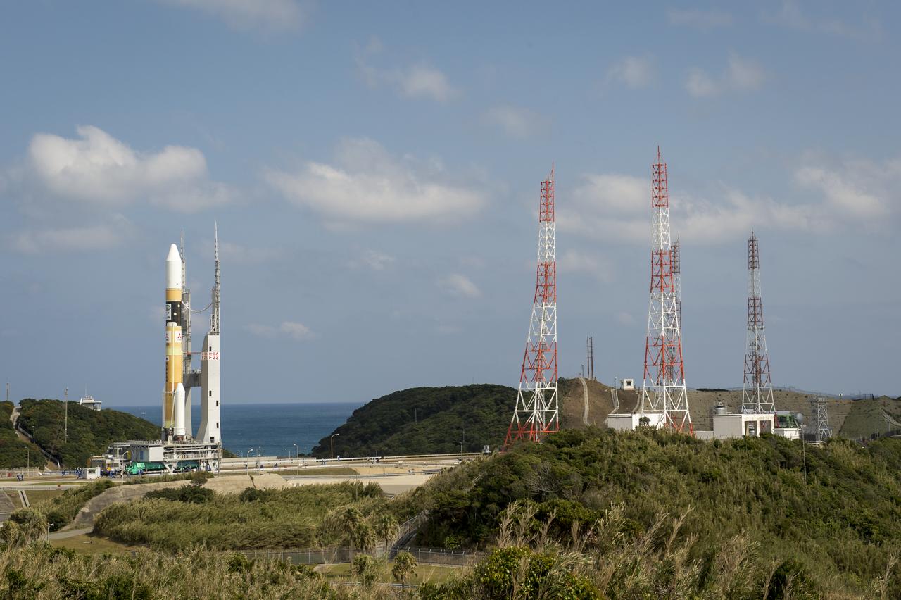 A Japanese H-IIA rocket carrying the NASA-Japan Aerospace Exploration Agency (JAXA), Global Precipitation Measurement (GPM) Core Observatory is seen as it rolls out to launch pad 1 of the Tanegashima Space Center, Thursday, Feb. 27, 2014, Tanegashima, Japan. Once launched, the GPM spacecraft will collect information that unifies data from an international network of existing and future satellites to map global rainfall and snowfall every three hours. Photo Credit: (NASA/Bill Ingalls)