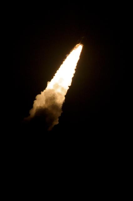 A Japanese H-IIA rocket with the NASA-Japan Aerospace Exploration Agency (JAXA), Global Precipitation Measurement (GPM) Core Observatory onboard, fades into the dark as it launches from the Tanegashima Space Center, Friday, Feb. 28, 2014, Tanegashima, Japan. The GPM spacecraft will collect information that unifies data from an international network of existing and future satellites to map global rainfall and snowfall every three hours. Photo Credit: (NASA/Bill Ingalls)