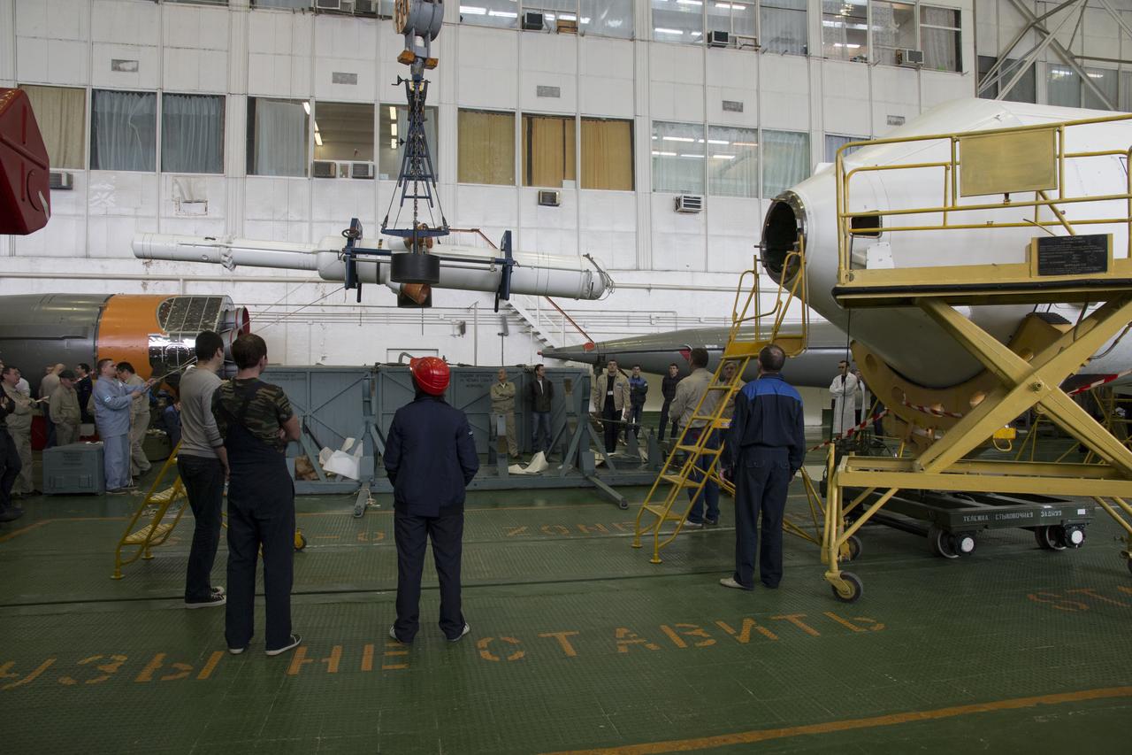 The Soyuz rocket and Soyuz TMA-12M spacecraft are assembled at Building 112 on the Baikonur Cosmodrome on Saturday, March 22, 2014 in Baikonur, Kazakhstan. Launch of the Soyuz is scheduled for March 26 and will send Expedition 39 Soyuz Commander Alexander Skvortsov of the Russian Federal Space Agency, Roscosmos, Flight Engineer Steven Swanson of NASA, and Flight Engineer Oleg Artemyev of Roscosmos on a six month mission to the International Space Station.  Photo Credit: (NASA/Victor Zelentsov)