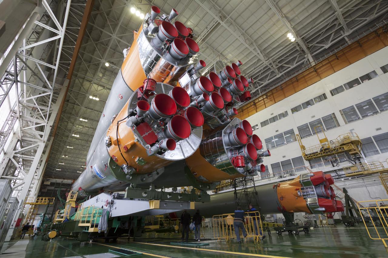 The Soyuz rocket and Soyuz TMA-12M spacecraft are assembled at Building 112 on the Baikonur Cosmodrome on Saturday, March 22, 2014 in Baikonur, Kazakhstan. Launch of the Soyuz is scheduled for March 26 and will send Expedition 39 Soyuz Commander Alexander Skvortsov of the Russian Federal Space Agency, Roscosmos, Flight Engineer Steven Swanson of NASA, and Flight Engineer Oleg Artemyev of Roscosmos on a six month mission to the International Space Station.  Photo Credit: (NASA/Victor Zelentsov)