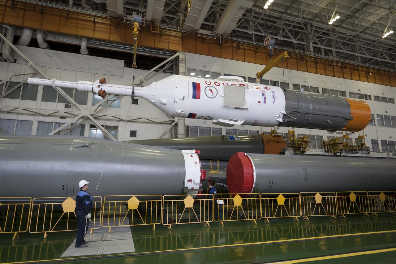 The Soyuz rocket and Soyuz TMA-12M spacecraft are assembled at Building 112 on the Baikonur Cosmodrome on Saturday, March 22, 2014 in Baikonur, Kazakhstan. Launch of the Soyuz is scheduled for March 26 and will send Expedition 39 Soyuz Commander Alexander Skvortsov of the Russian Federal Space Agency, Roscosmos, Flight Engineer Steven Swanson of NASA, and Flight Engineer Oleg Artemyev of Roscosmos on a six month mission to the International Space Station.  Photo Credit: (NASA/Victor Zelentsov)