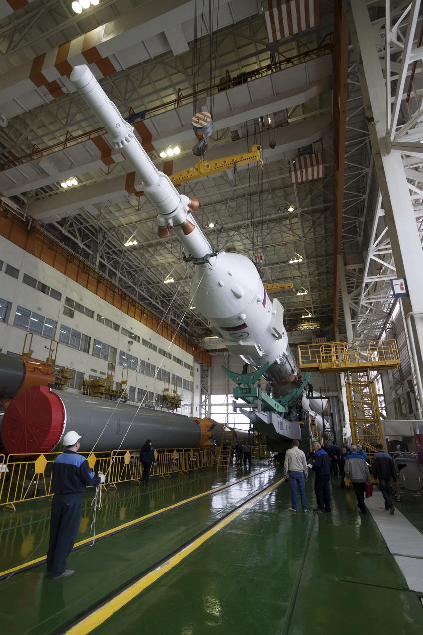 The Soyuz rocket and Soyuz TMA-12M spacecraft are assembled at Building 112 on the Baikonur Cosmodrome on Saturday, March 22, 2014 in Baikonur, Kazakhstan. Launch of the Soyuz is scheduled for March 26 and will send Expedition 39 Soyuz Commander Alexander Skvortsov of the Russian Federal Space Agency, Roscosmos, Flight Engineer Steven Swanson of NASA, and Flight Engineer Oleg Artemyev of Roscosmos on a six month mission to the International Space Station.  Photo Credit: (NASA/Victor Zelentsov)