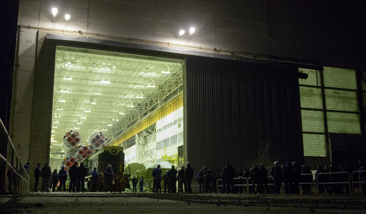 The Soyuz TMA-12M spacecraft is rolled out to the launch pad by train on Sunday, March 23, 2014, at the Baikonur Cosmodrome in Kazakhstan.  Launch of the Soyuz rocket is scheduled for March 26 and will send Expedition 39 Soyuz Commander Alexander Skvortsov of the Russian Federal Space Agency, Roscosmos, Flight Engineer Steven Swanson of NASA, and Flight Engineer Oleg Artemyev of Roscosmos on a six-month mission aboard the International Space Station.  Photo Credit: (NASA/Joel Kowsky)