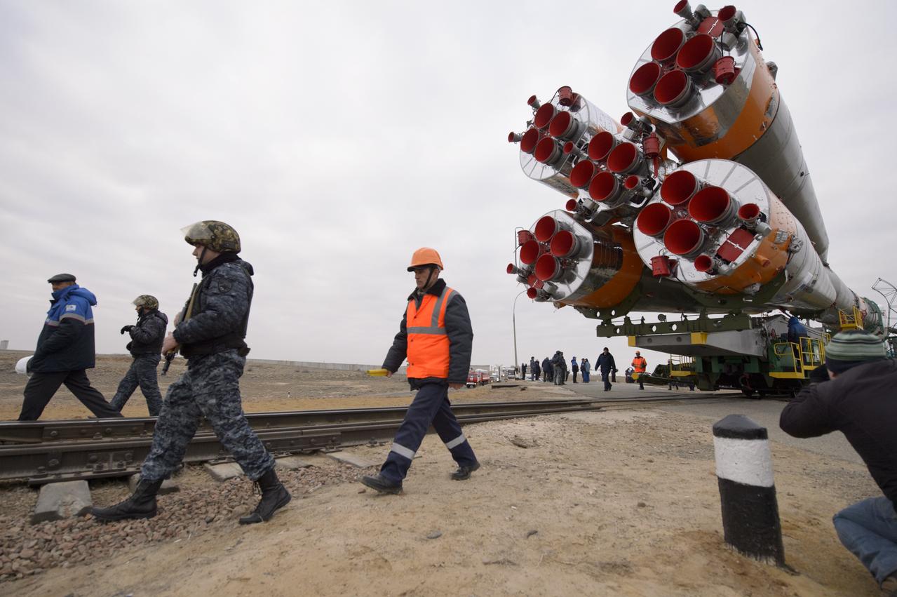 The Soyuz TMA-12M spacecraft is rolled out to the launch pad by train on Sunday, March 23, 2014, at the Baikonur Cosmodrome in Kazakhstan.  Launch of the Soyuz rocket is scheduled for March 26 and will send Expedition 39 Soyuz Commander Alexander Skvortsov of the Russian Federal Space Agency, Roscosmos, Flight Engineer Steven Swanson of NASA, and Flight Engineer Oleg Artemyev of Roscosmos on a six-month mission aboard the International Space Station.  Photo Credit: (NASA/Joel Kowsky)