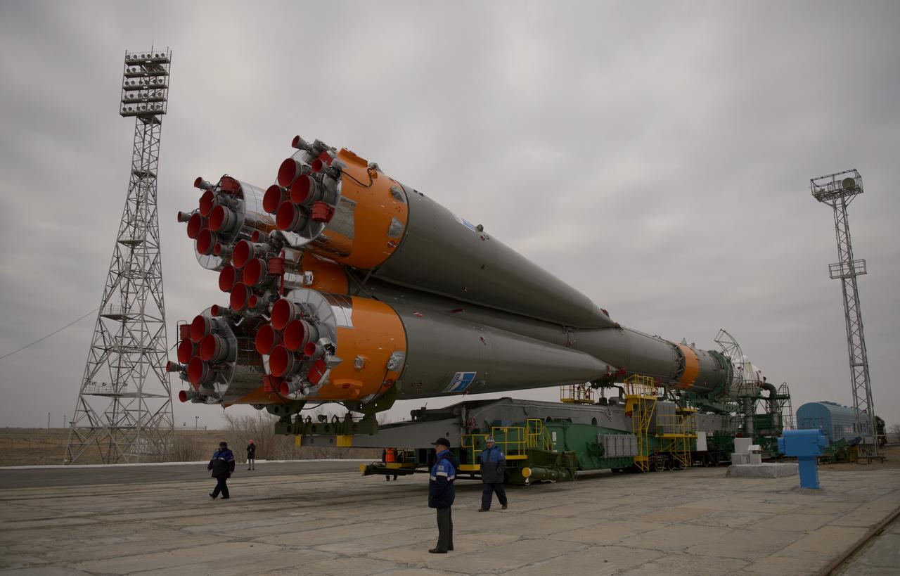 The Soyuz TMA-12M spacecraft is rolled out to the launch pad by train on Sunday, March 23, 2014, at the Baikonur Cosmodrome in Kazakhstan. Launch of the Soyuz rocket is scheduled for March 26 and will send Expedition 39 Soyuz Commander Alexander Skvortsov of the Russian Federal Space Agency, Roscosmos, Flight Engineer Steven Swanson of NASA, and Flight Engineer Oleg Artemyev of Roscosmos on a six-month mission aboard the International Space Station. Photo Credit: (NASA/Joel Kowsky)