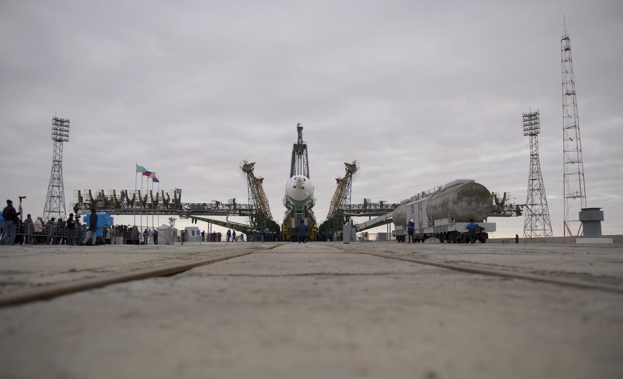 The Soyuz TMA-12M spacecraft is seen before being raised at the launch pad on Sunday, March 23, 2014, at the Baikonur Cosmodrome in Kazakhstan.  Launch of the Soyuz rocket is scheduled for March 26 and will send Expedition 39 Soyuz Commander Alexander Skvortsov of the Russian Federal Space Agency, Roscosmos, Flight Engineer Steven Swanson of NASA, and Flight Engineer Oleg Artemyev of Roscosmos on a six-month mission aboard the International Space Station.  Photo Credit: (NASA/Joel Kowsky)
