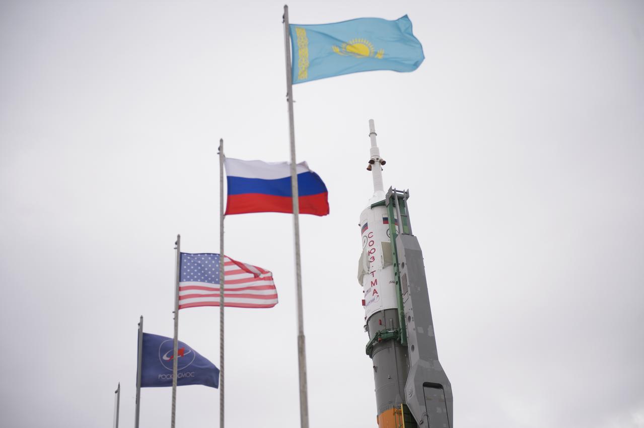 The Soyuz TMA-12M spacecraft is seen after being erected on the launch pad on Sunday, March 23, 2014, at the Baikonur Cosmodrome in Kazakhstan.  Launch of the Soyuz rocket is scheduled for March 26 and will send Expedition 39 Soyuz Commander Alexander Skvortsov of the Russian Federal Space Agency, Roscosmos, Flight Engineer Steven Swanson of NASA, and Flight Engineer Oleg Artemyev of Roscosmos on a six-month mission aboard the International Space Station.  Photo Credit: (NASA/Joel Kowsky)