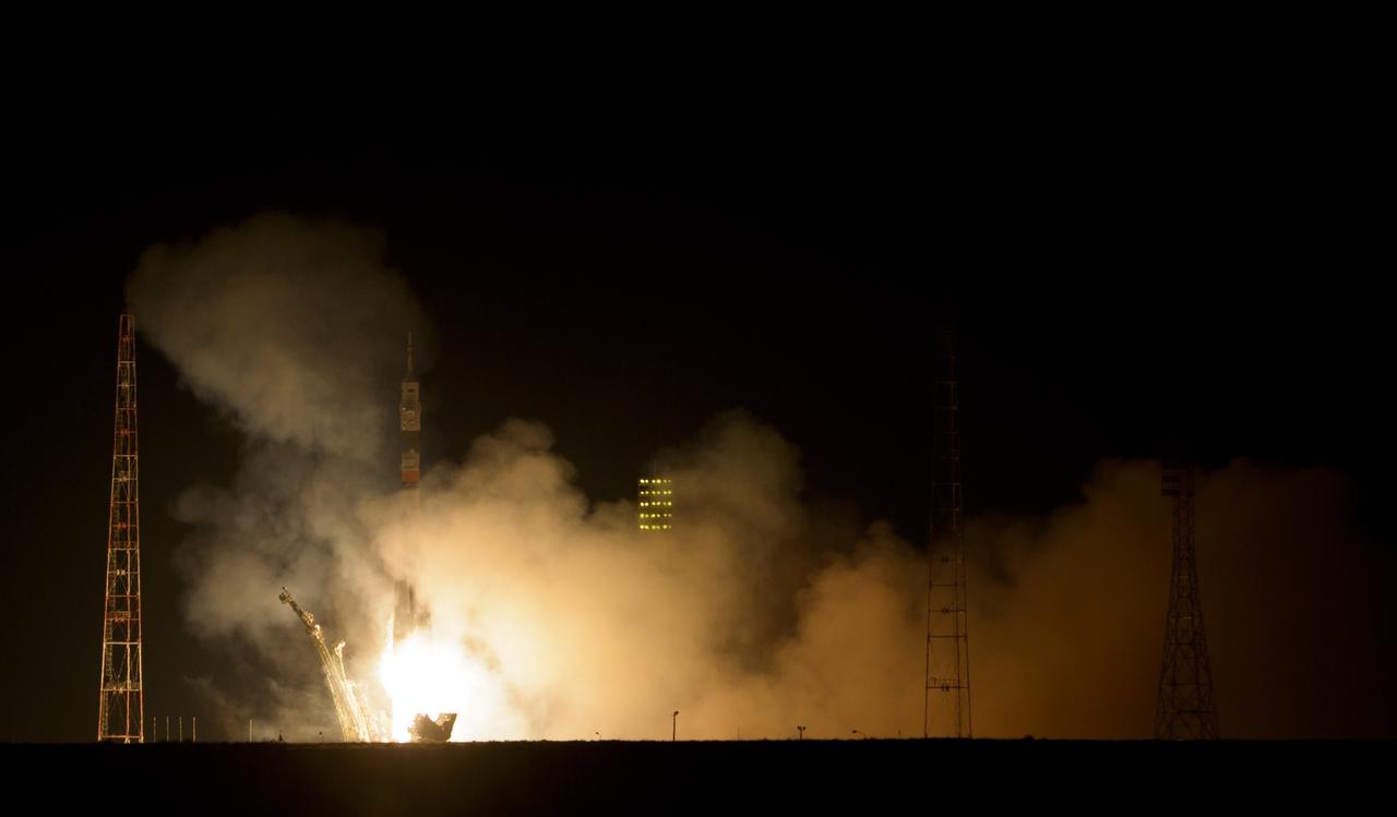 The Soyuz TMA-12M rocket launches from Baikonur Cosmodrome in Kazakhstan on  Wednesday, March 26, 2014 carrying Expedition 39 Soyuz Commander Alexander Skvortsov of the Russian Federal Space Agency, Roscosmos, Flight Engineer Steven Swanson of NASA, and Flight Engineer Oleg Artemyev of Roscosmos to the International Space Station. Photo Credit: (NASA/Joel Kowsky)