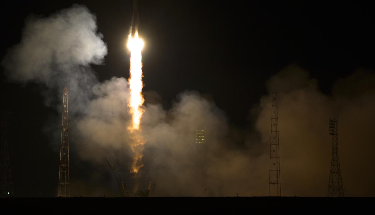 The Soyuz TMA-12M rocket launches from Baikonur Cosmodrome in Kazakhstan on  Wednesday, March 26, 2014 carrying Expedition 39 Soyuz Commander Alexander Skvortsov of the Russian Federal Space Agency, Roscosmos, Flight Engineer Steven Swanson of NASA, and Flight Engineer Oleg Artemyev of Roscosmos to the International Space Station. Photo Credit: (NASA/Joel Kowsky)