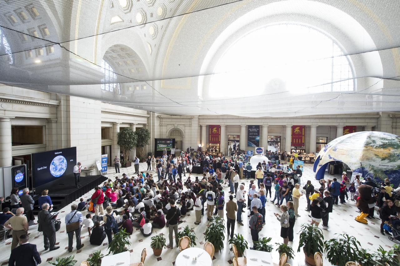 Students listen intently while NASA's Director, Earth Science Division, Mike Freilich, speaks at NASA's Earth Day event. The event took place at Union Station in Washington, DC on April 22, 2014. Photo Credit: (NASA/Aubrey Gemignani)