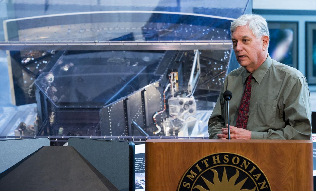 John Trauger, former principal investigator for the Wide Field Planetary Camera 2 (WFPC2) at NASA's Jet Propultion Laboratory (JPL), speaks at an event unveiling a new exhibit featuring Hubble's Corrective Optics Space Telescope Axial Replacement (COSTAR) and the WFPC2 on Wednesday, April 23, 2014 at the Smithsonian National Air and Space Museum in Washington, DC. COSTAR and WFPC2 were installed in Hubble during the first space shuttle servicing mission in 1993 and returned to Earth on the fifth and final servicing mission in 2009.  Photo Credit: (NASA/Joel Kowsky)