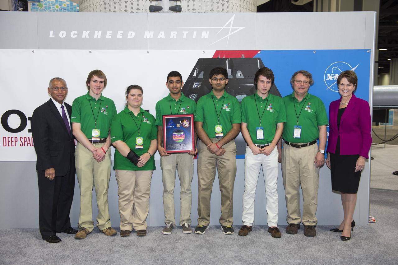 Team ARES poses with NASA Administrator Charles Bolden and Lockheed Martin CEO, Marillyn Hewson. Team ARES was the winner of the Exploration Design Challenge. The goal of the Exploration Design Challenge is for students to research and design ways to protect astronauts from space radiation. The winning team was announced on April 25, 2014 at the USA Science and Engineering Festival at the Washington Convention Center in Washington, DC. Photo Credit: (NASA/Aubrey Gemignani)