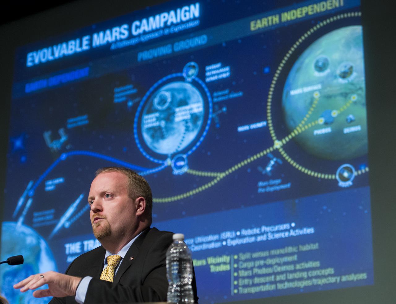 Jason Crusan, Director of NASA's Advanced Exploration Systems Division, speaks during an Exploration Forum showcasing NASA's human exploration path to Mars in the James E. Webb Auditorium at NASA Headquarters on Tuesday, April 29, 2014. Photo Credit: (NASA/Joel Kowsky)