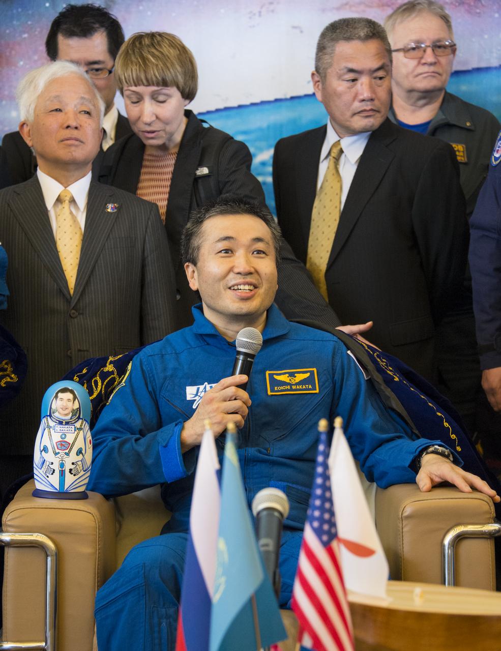 Expedition 39 Commander Koichi Wakata of the Japan Aerospace Exploration Agency (JAXA) answers questions from the media during a welcome home ceremony, Wednesday, May 14, 2014 at the Karaganda Airport in Kazakhstan. Wakata, Expedition 39 Soyuz Commander Mikhail Tyurin of Roscosmos, and Flight Engineer Rick Mastracchio of NASA landed in their Soyuz TMA-11M spacecraft just a few hours earlier near the town of Zhezkazgan. Wakata, Tyurin and Mastracchio returned to Earth after more than six months onboard the International Space Station where they served as members of the Expedition 38 and 39 crews. Photo Credit: (NASA/Bill Ingalls)